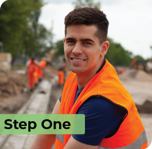Construction worker smiling while on worksite. Step One. Construction worker smiling while on worksite. Step One.