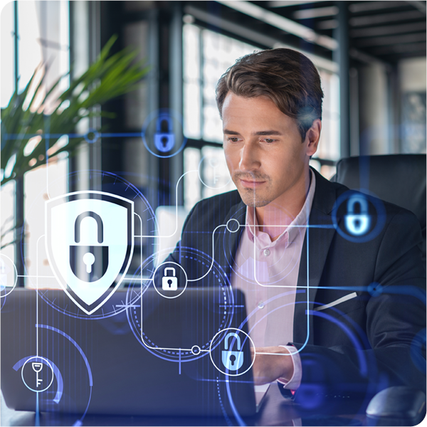 businessman on computer with security locks protecting his business's devices businessman on computer with security locks protecting his business's devices